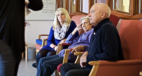 people sitting in a waiting room 