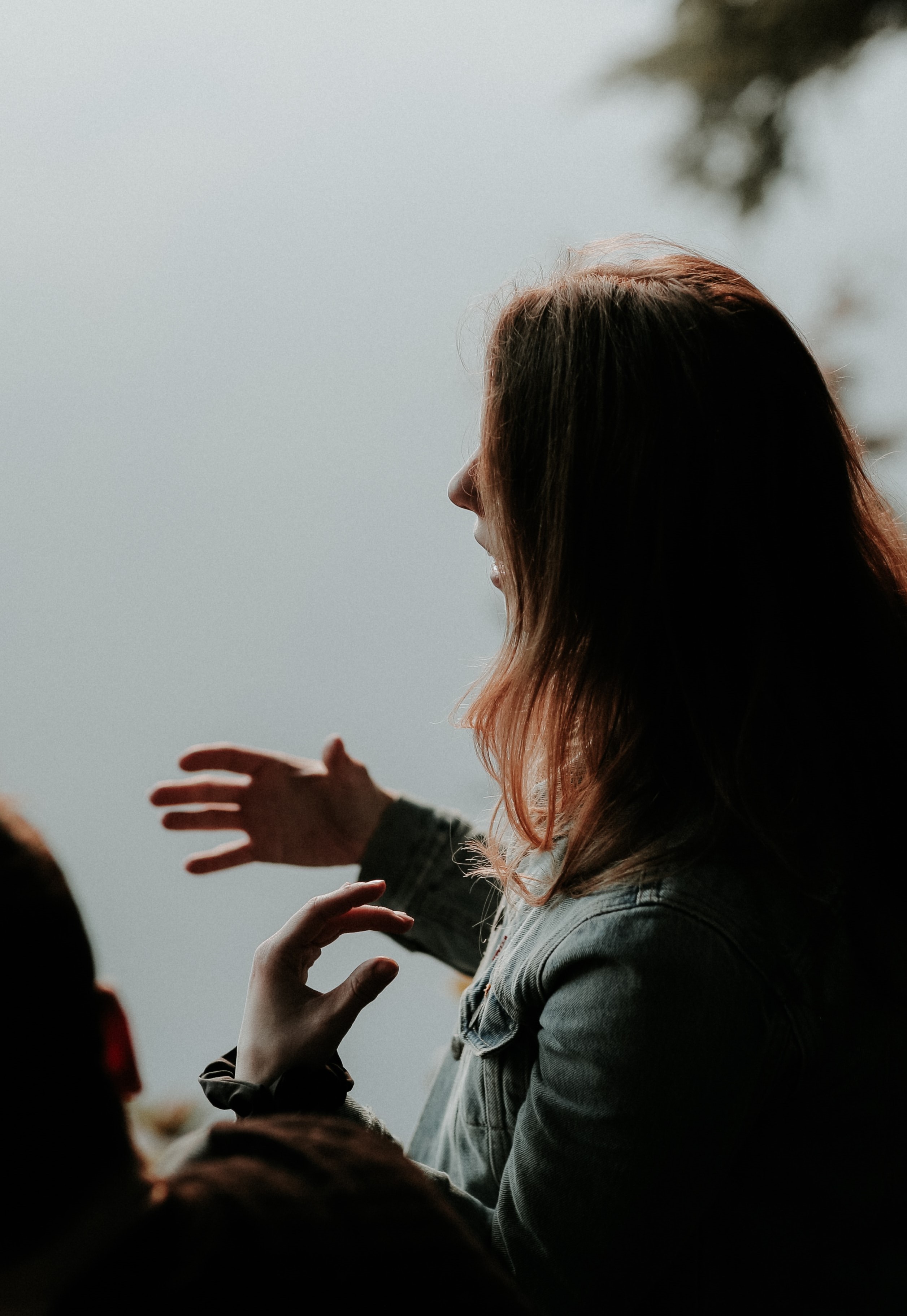 a lady talking to a group