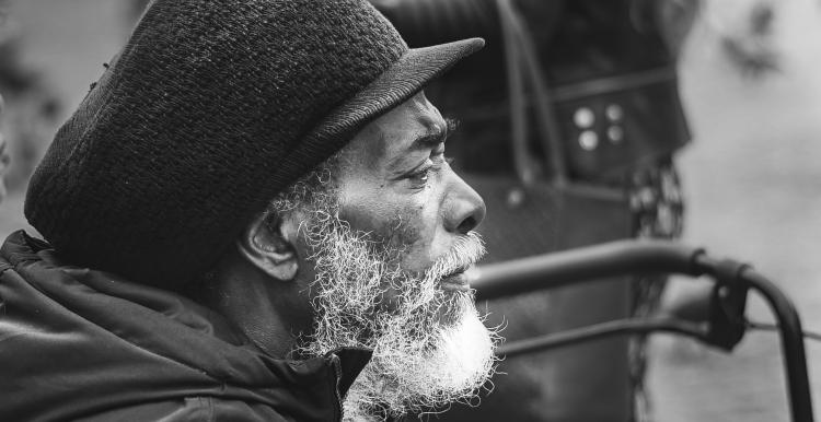 old man sitting outside