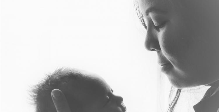 Mother holding her baby