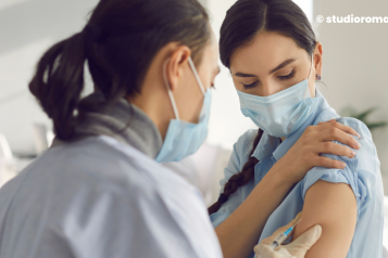 A woman having a vaccination
