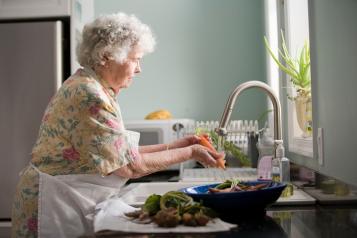 a person washing up dishes