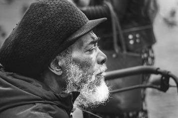 old man sitting outside