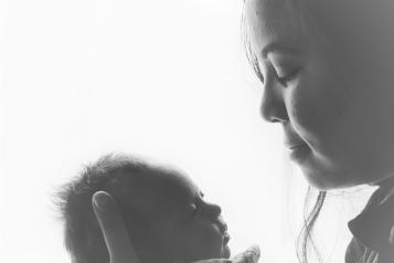 Mother holding her baby