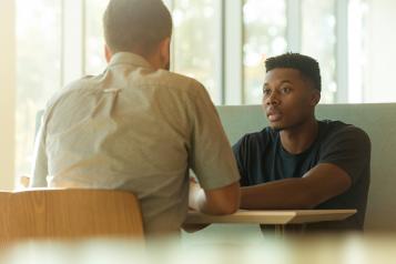 Healthwatch Lambeth a picture of someone talking to GP about mental health 