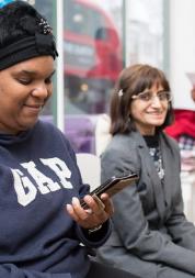 two people in a waiting room 