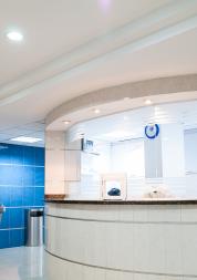 two older people walking in a park